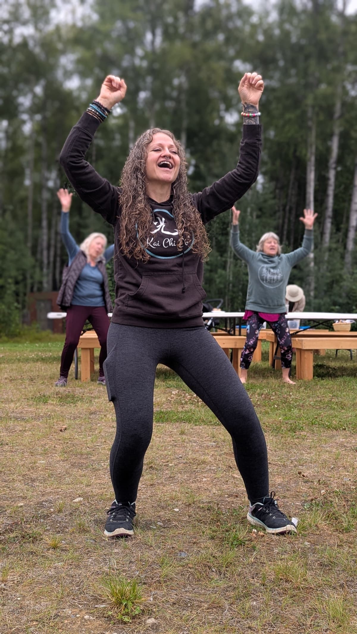 Woman dancing and laughing